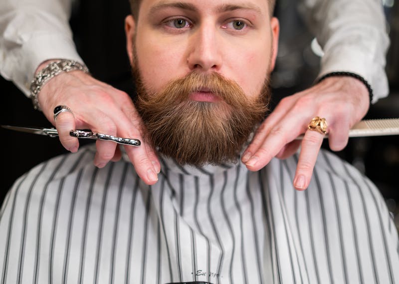 A man gets a moustache and beard trim. Photo: Cottonbro / Pexels